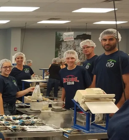 Multiple coworkers with hair nets