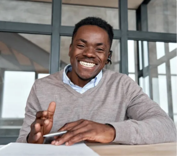 A happy man, looking at the camera